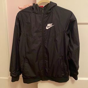 Kids black Nike rain coat/windbreaker.